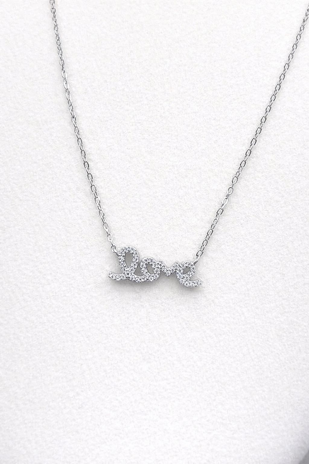 .925 Sterling Silver Rhodium Plated Clear CZ Love Pendant Necklace